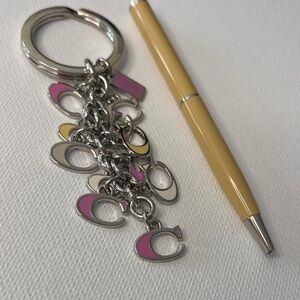 Coach Pink and Yellow Keychain and Coach Pen